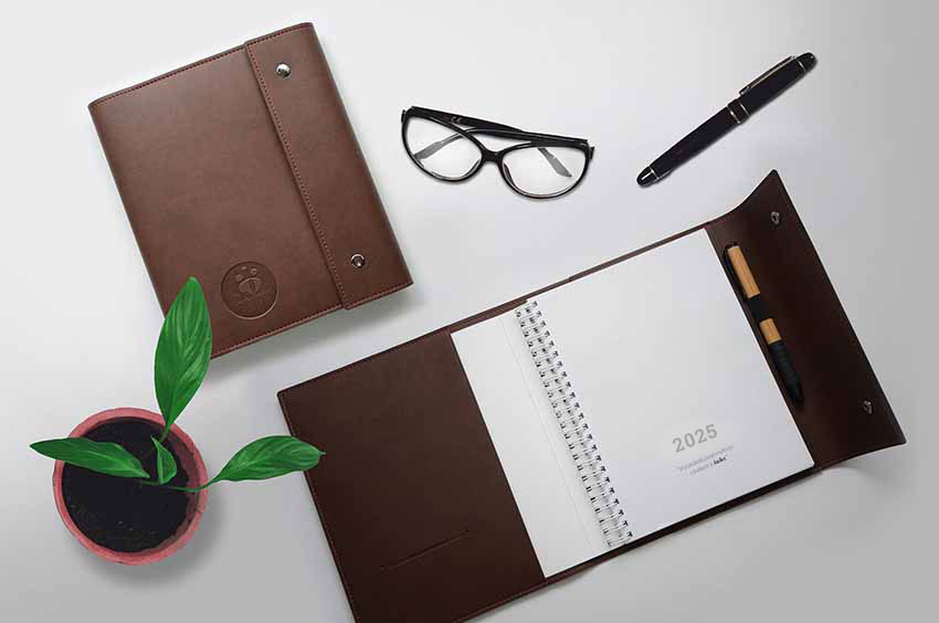 Production of the 2025 planner in leather covers